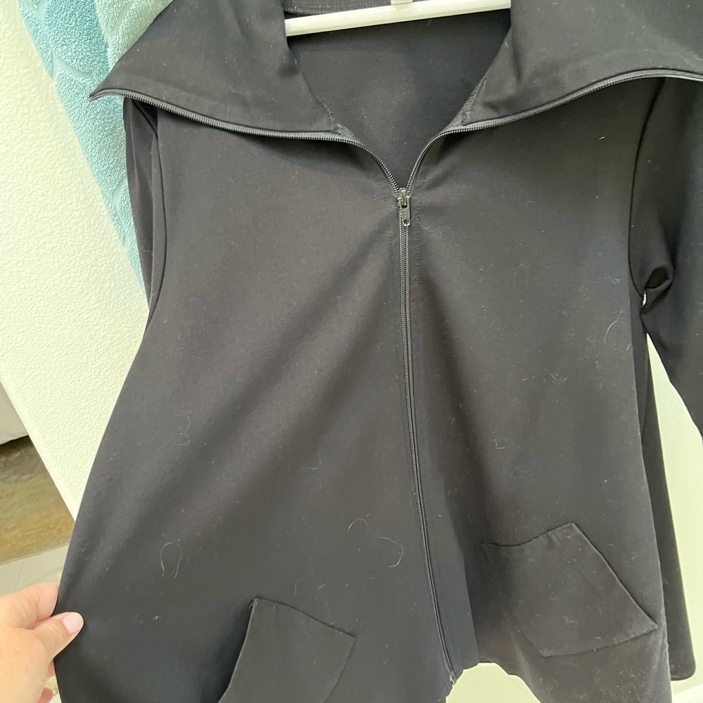 FH Clothing and Co size medium. Black swing stretch jacket. With wide collar.